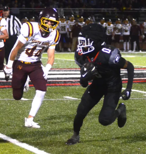 Girard outlasts South Range in high-scoring meeting